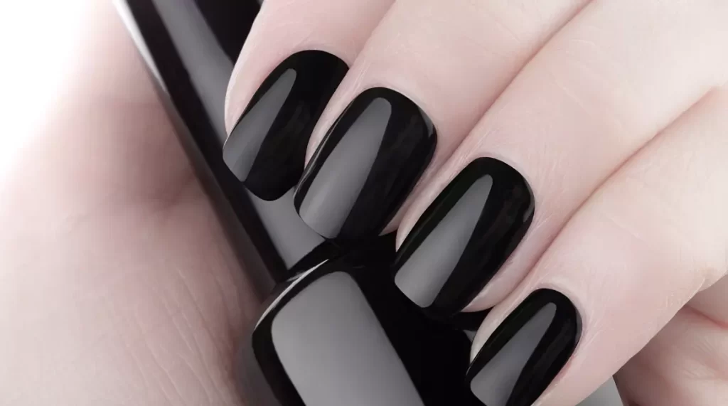 Why do guys paint their nails black